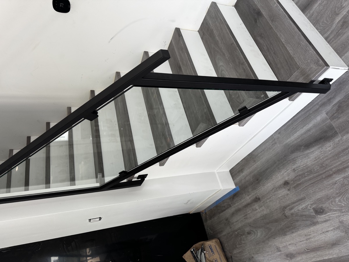 Glass and steel staircase railing