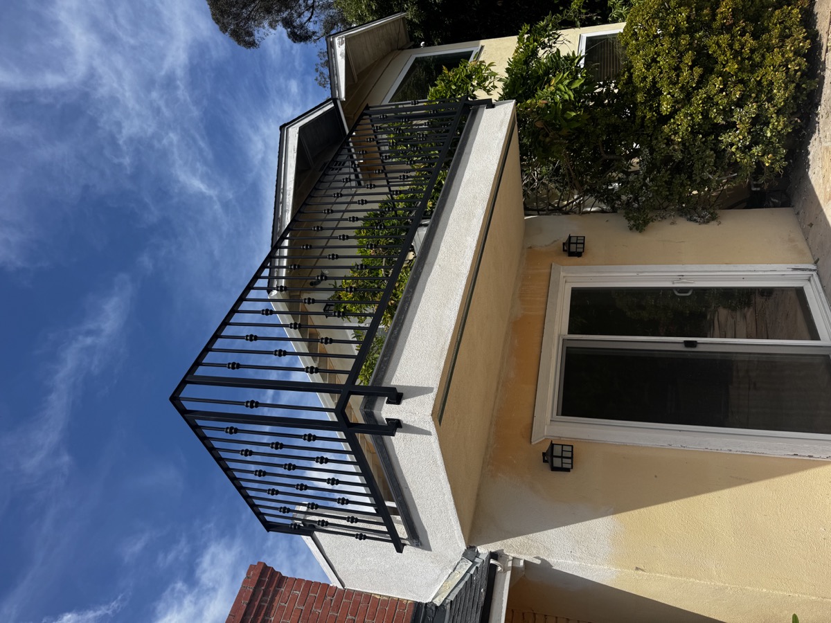 Iron balcony railing on building