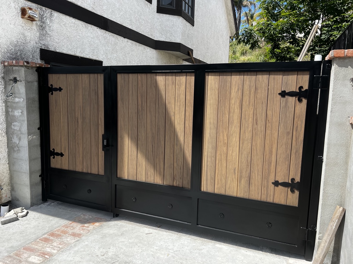 Custom wood and metal side gate with decorative hardware