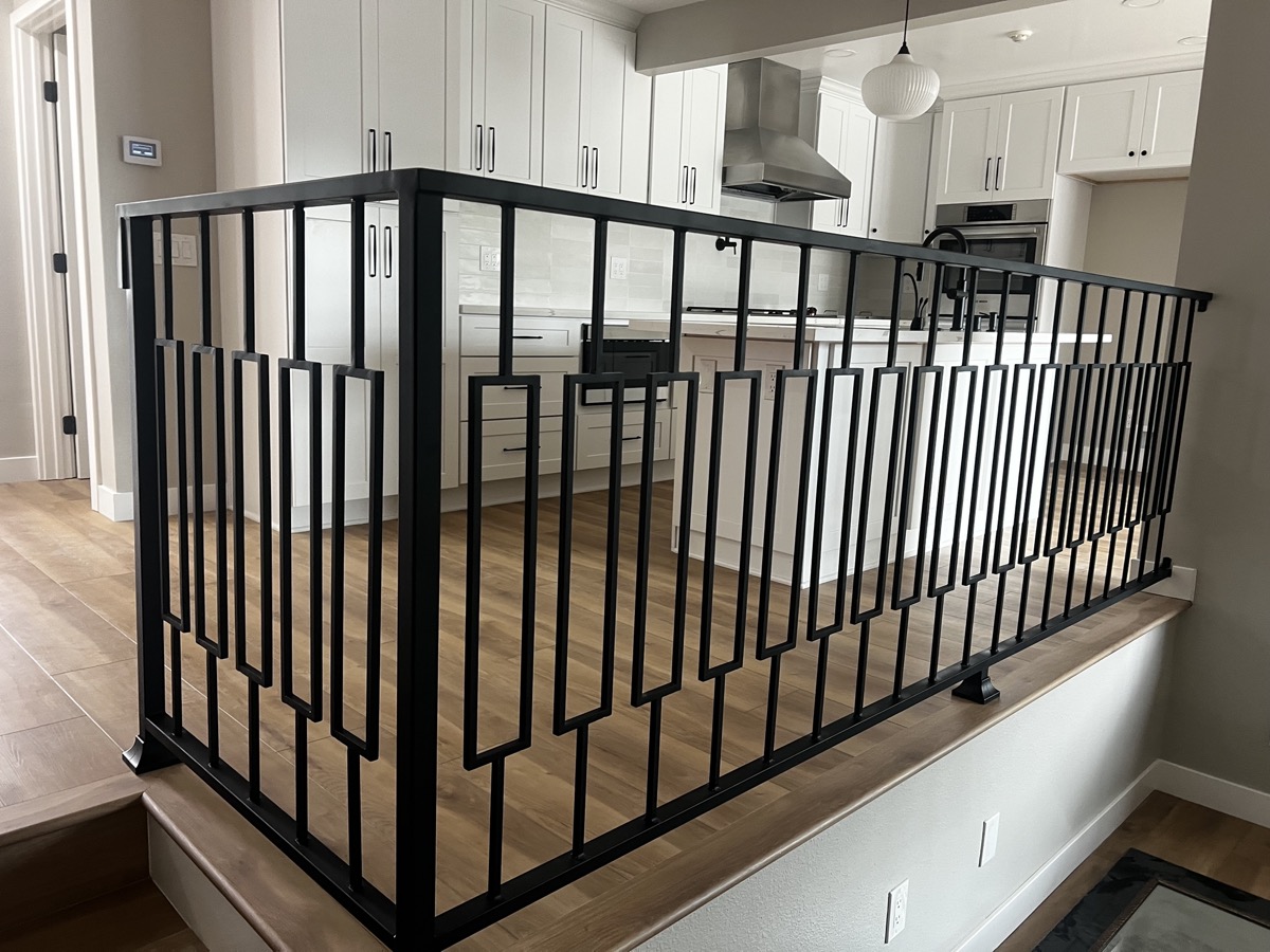 Modern geometric interior railing by Legendary Metal Works