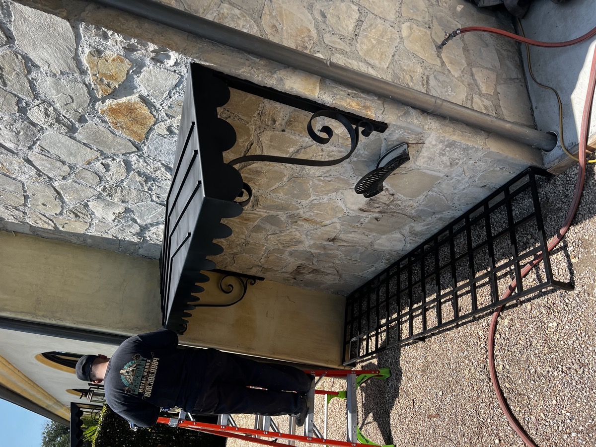 Iron bracket and railing installation